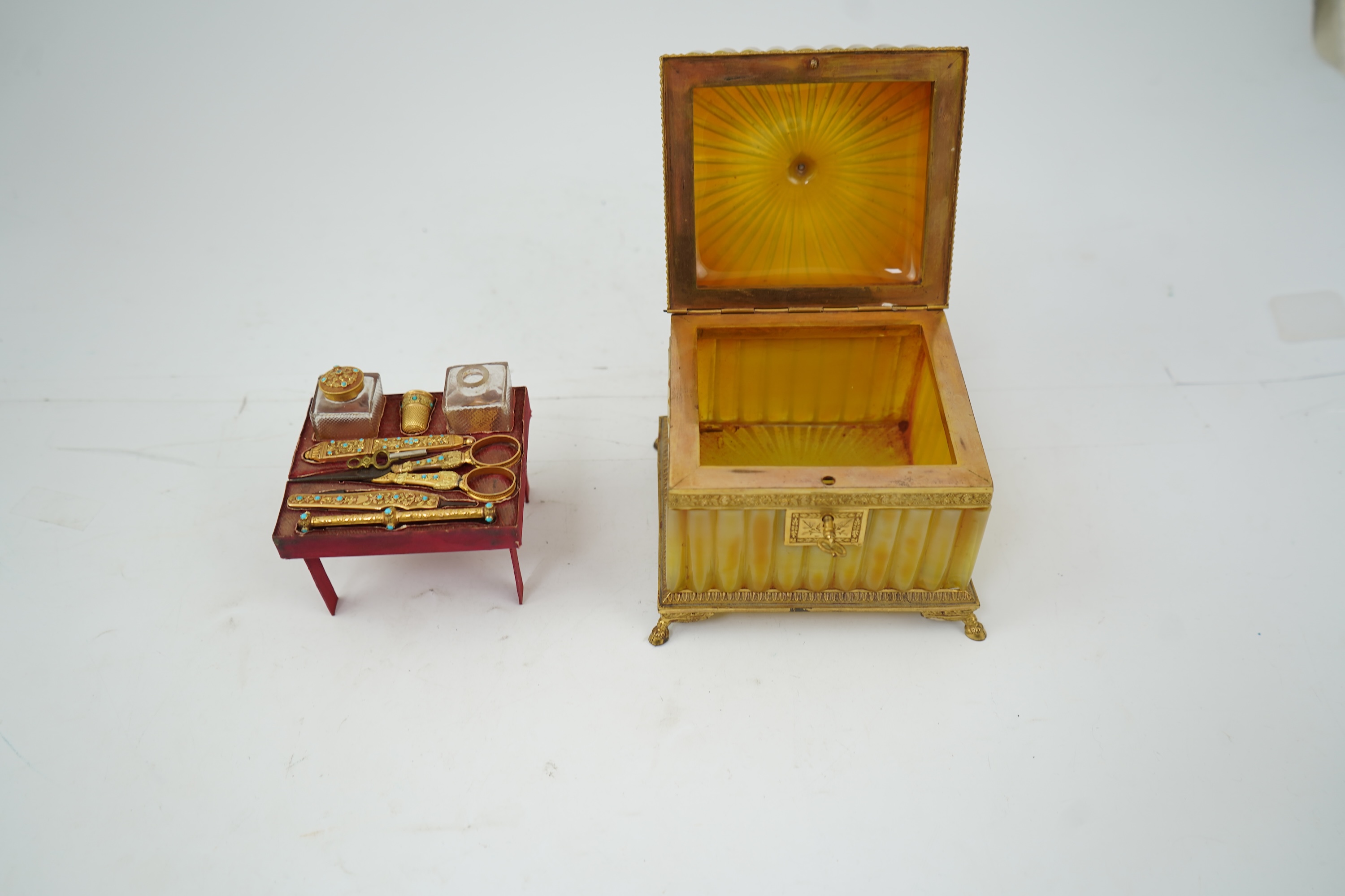 A mid 19th century French opaline glass necessaire box with turquoise and gold mounted accessories